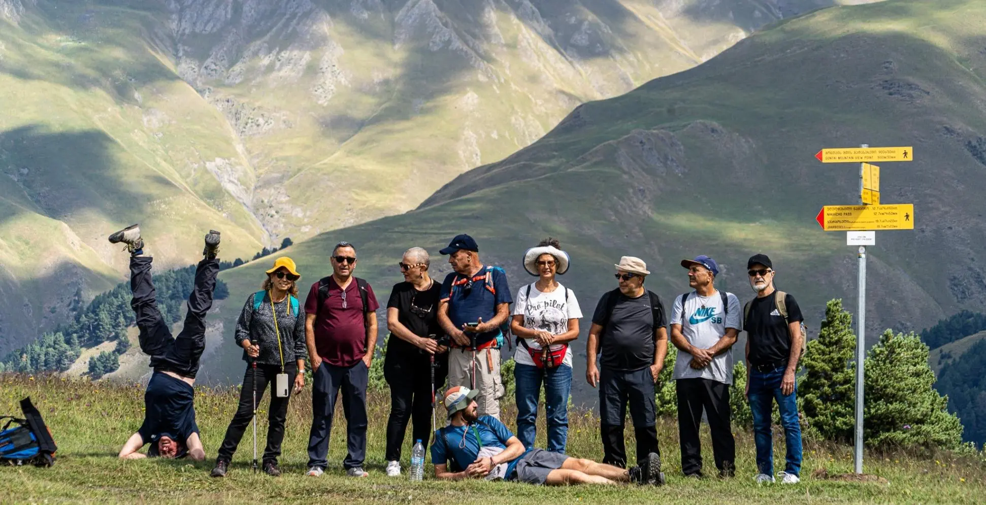 Small hiking group gathered in the Caucasus Mountains