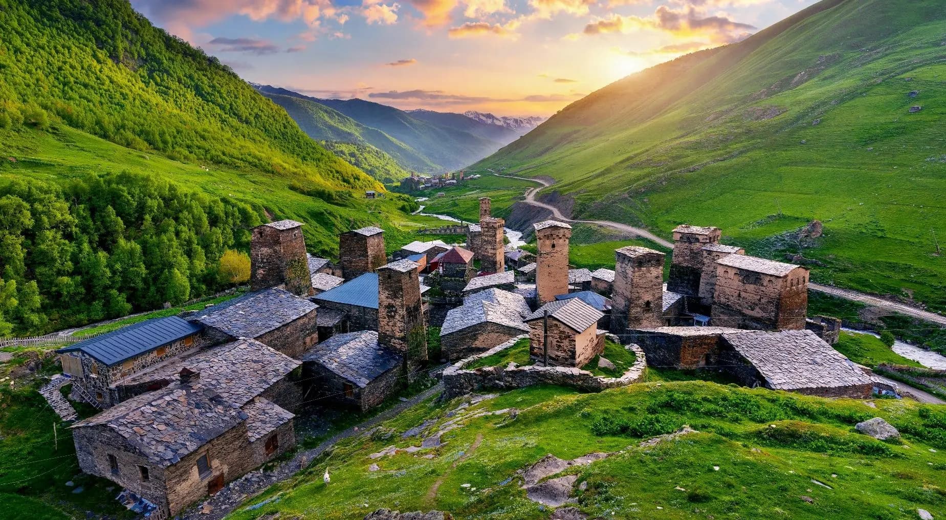Historic stone towers in Georgia at sunset