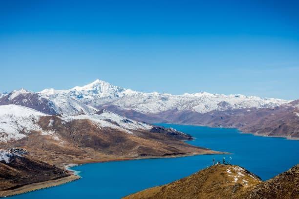 A sacred lake surrounded by the mountains of Tibet